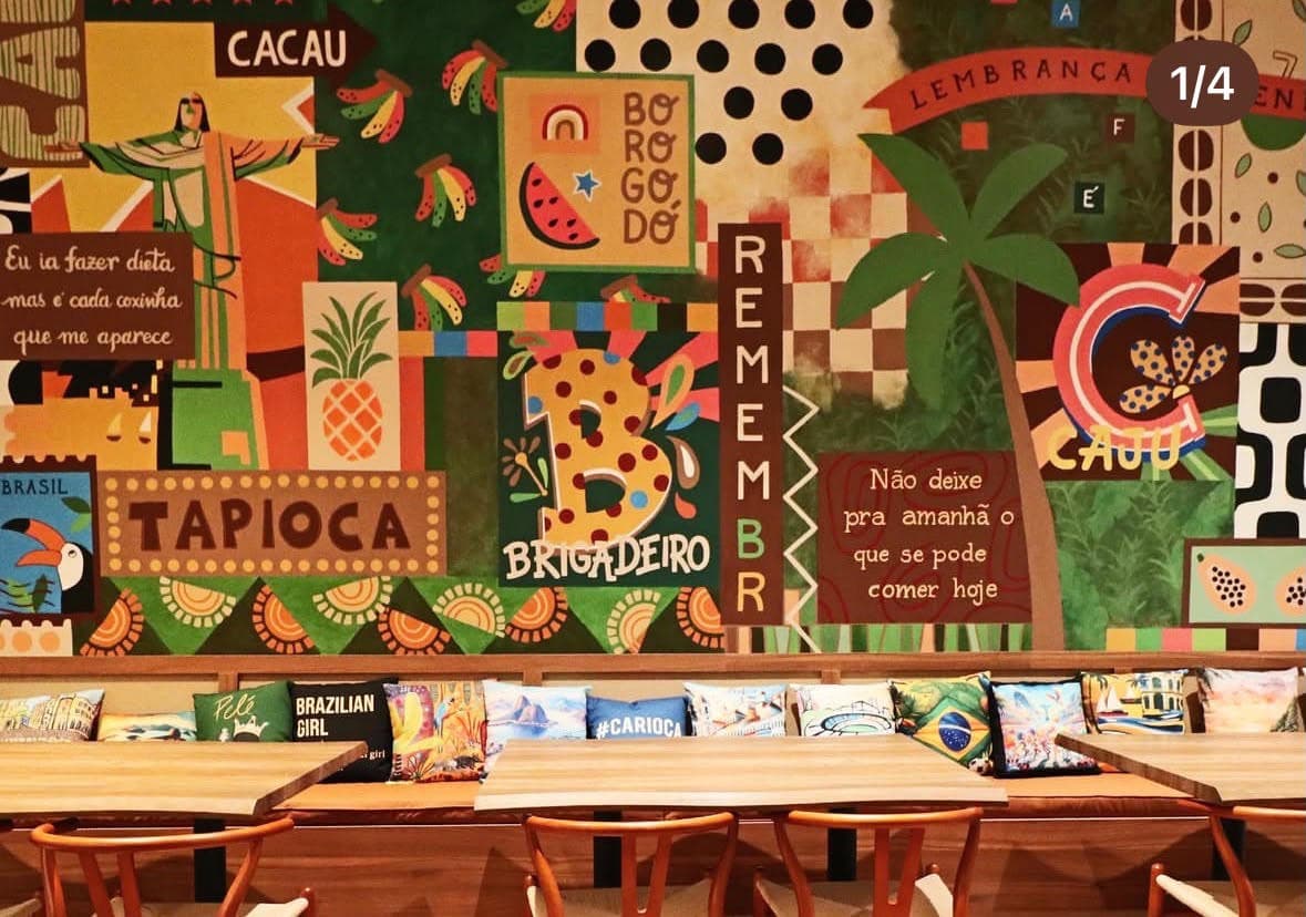 Colorful Brazilian mural and seating inside RememBR Weston
